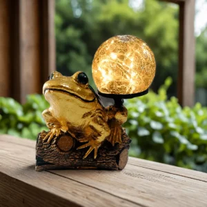 Rana dorada solar de Isartek con iluminación LED encendida
